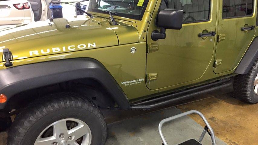 2007 Jeep Wrangler Rubicon Cowl Dent. Work was done by Michael Bocek from 217dent.com. Go to http://217dent.com an estimate, or for more information about paintless dent removal.
