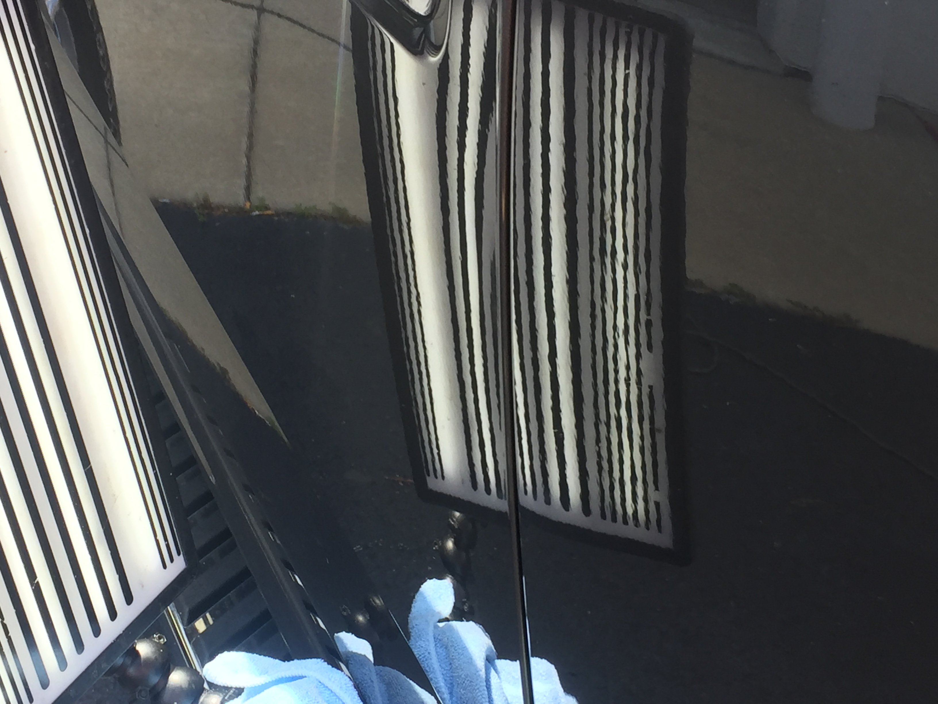 www.217dent.com 2015 Grey Aluminum Ford F-150 driver's side door dent removal near door-handle.