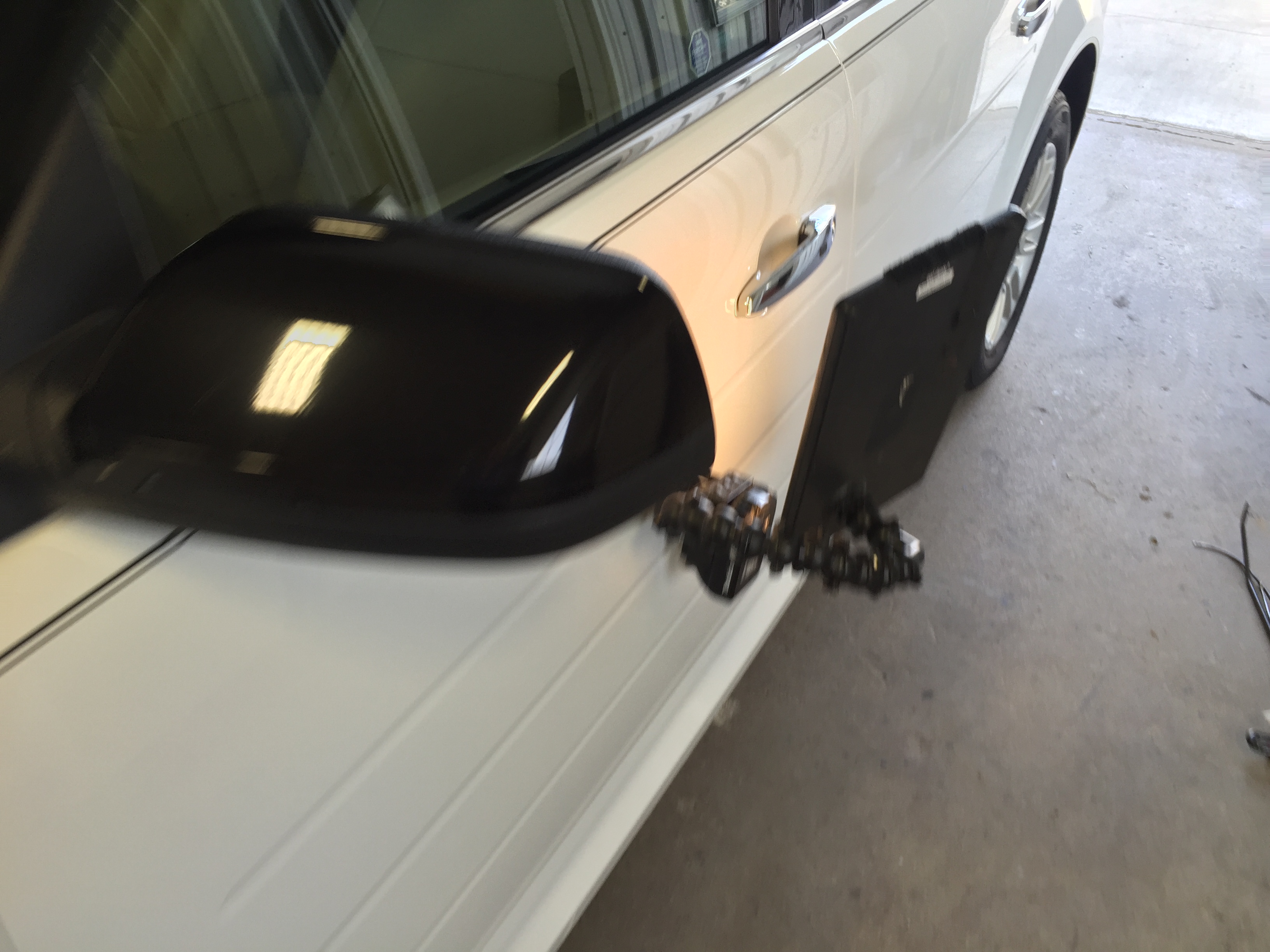 2015 Ford Flex, Dent Removal in the drivers door, Image's of before during and after this dent removal process. Paintless Dent Repair, Springfield, IL, http://217dent.com
