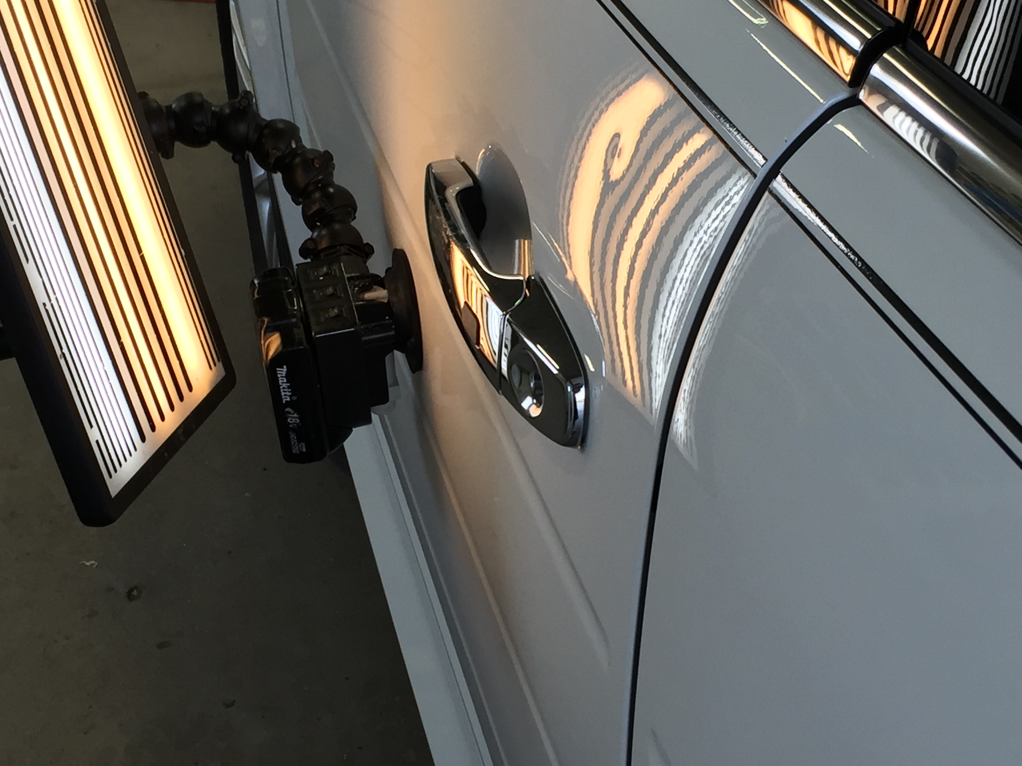 2015 Ford Flex, Dent Removal in the drivers door, Image's of before during and after this dent removal process. Paintless Dent Repair, Springfield, IL, http://217dent.com