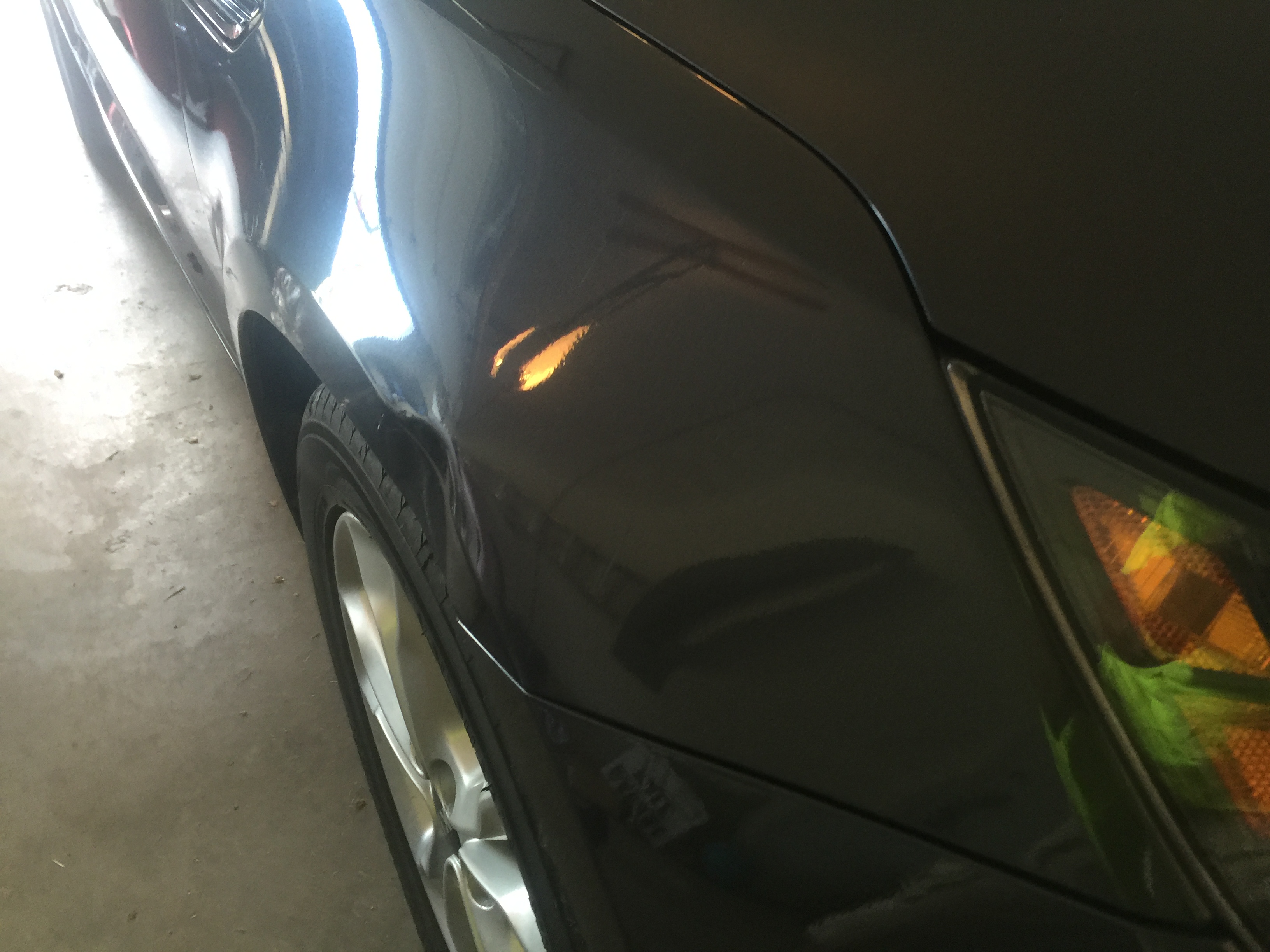 2011 Kia Optima Fender dent repair, with paintless dent removal process, large dent repair, in Springfield, IL. http://217dent.com