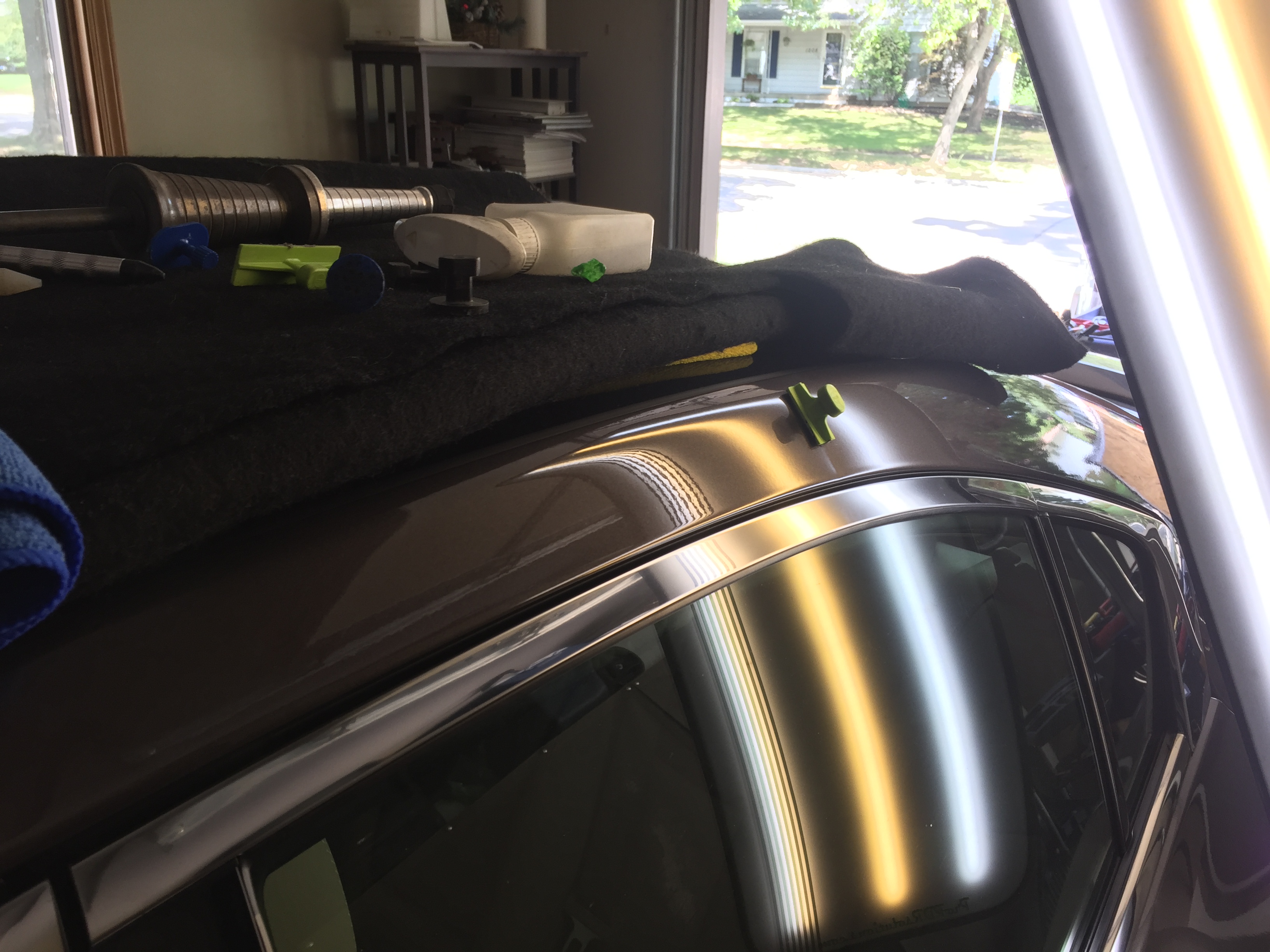 2013 Nissan Maxima Roof Rail Cressed Dent, Removed with the paintless dent removal process, and was removed by Michael Bocek out of Springfield, IL http://217dent.com