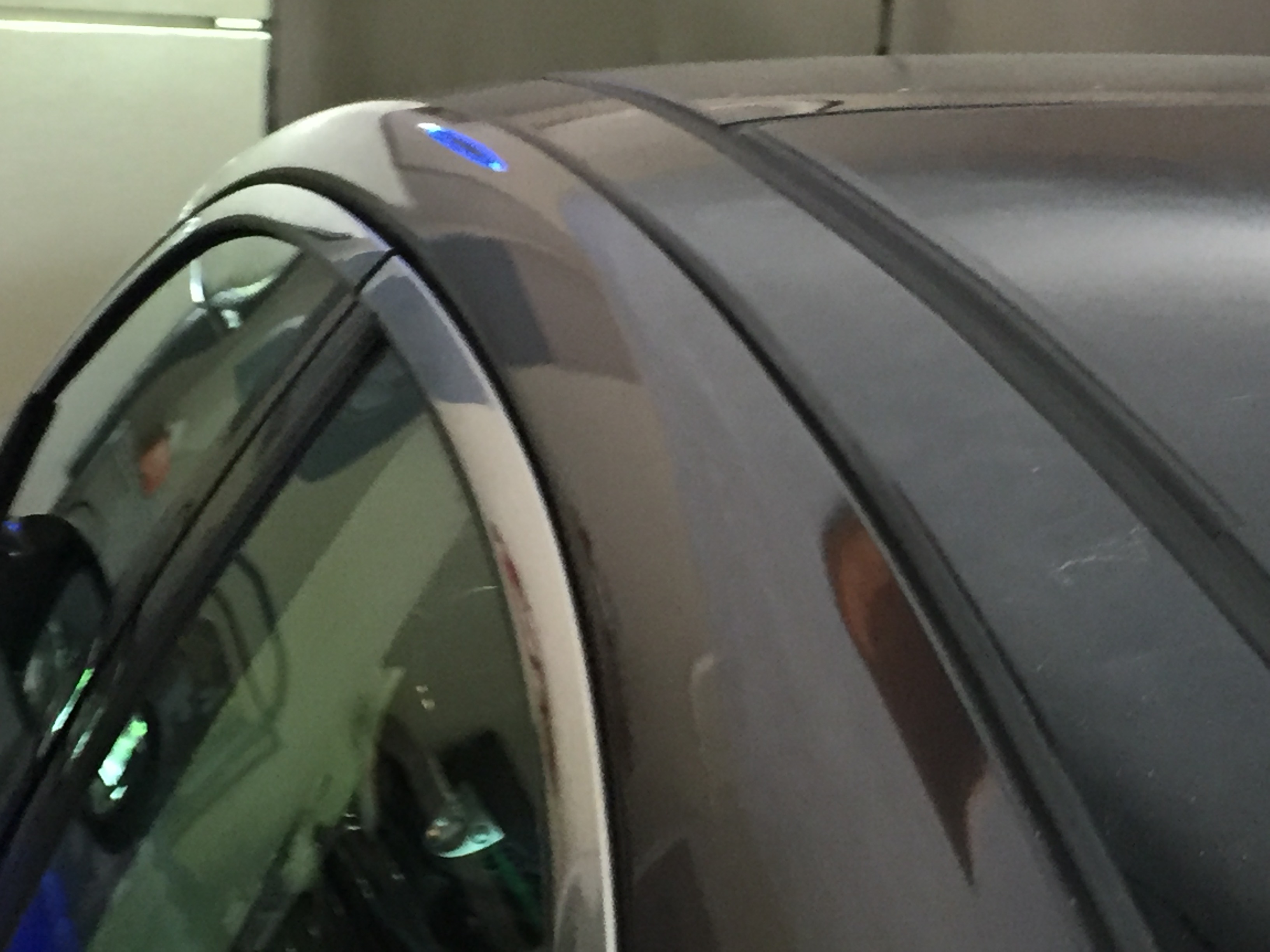 2013 Nissan Maxima Roof Rail Cressed Dent, Removed with the paintless dent removal process, and was removed by Michael Bocek out of Springfield, IL http://217dent.com