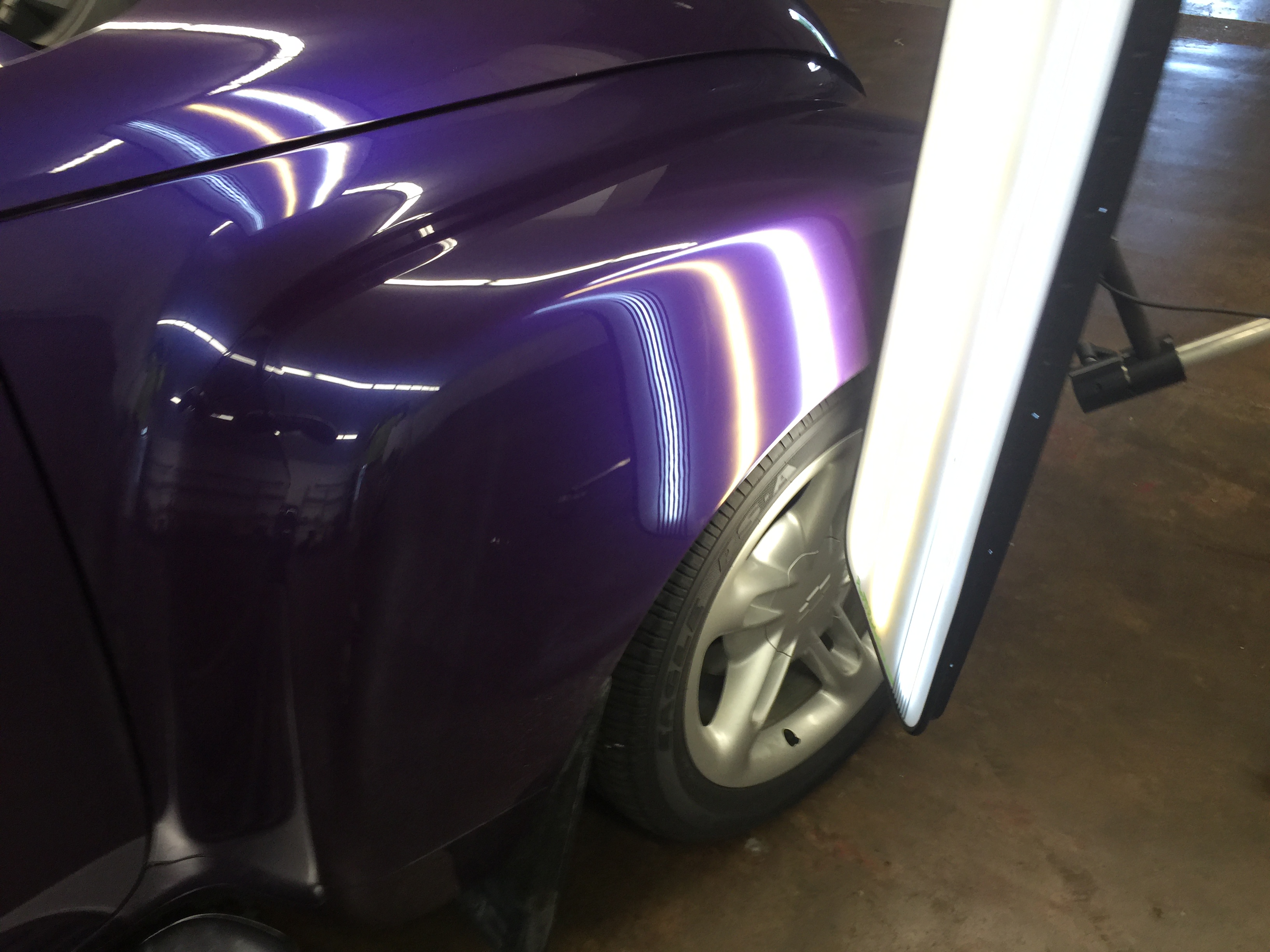 2004 Chevy SSR, Paintless Dent Removal on the passenger fender, removed by Michael Bocek out of Springfield, IL http://217dent.com