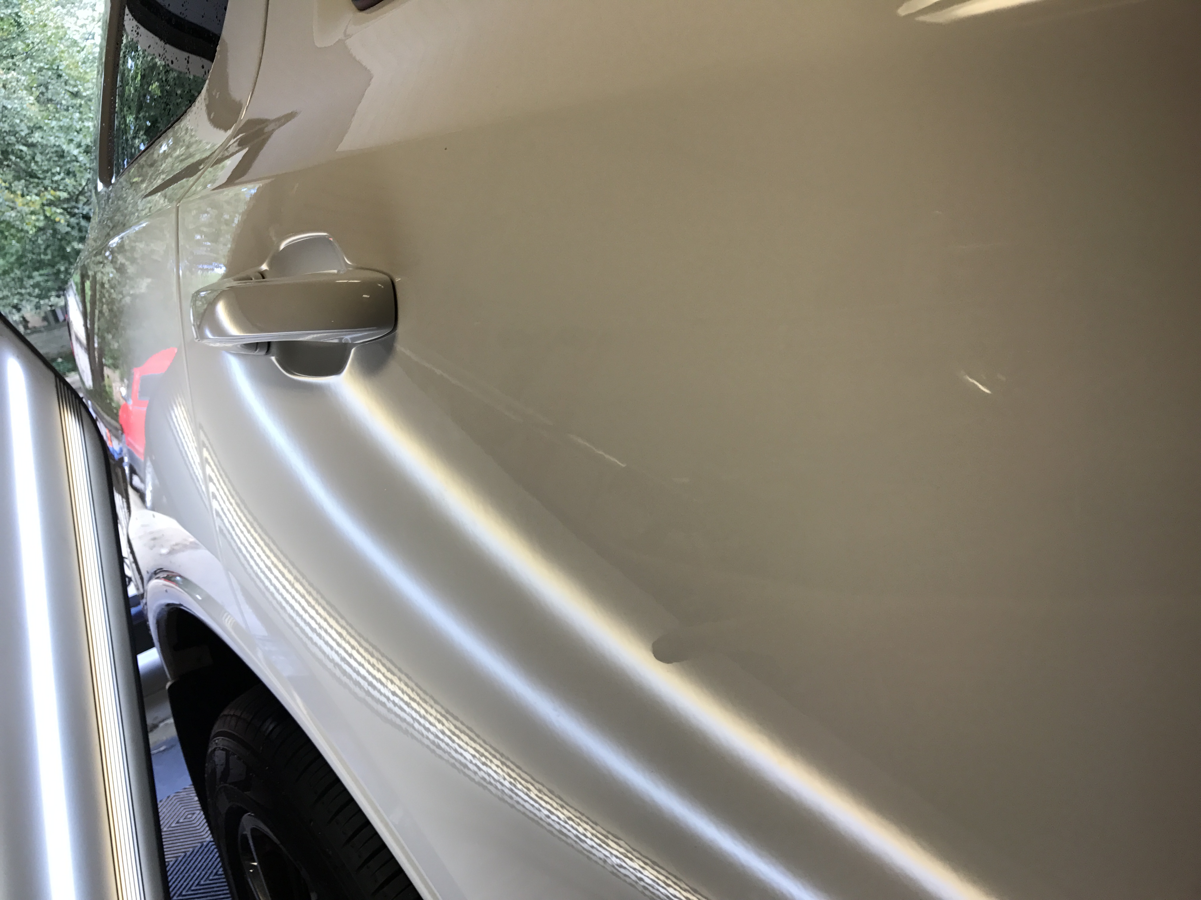 2015 Dodge Durango RT Paintless Dent Removal, Springfield IL http://217dent.com After Image of door damage
