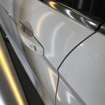 2016 Ford Escape, three dents in the drivers door, removed by Michael Bocek out of Springfield, IL. After Image http://217dent.com