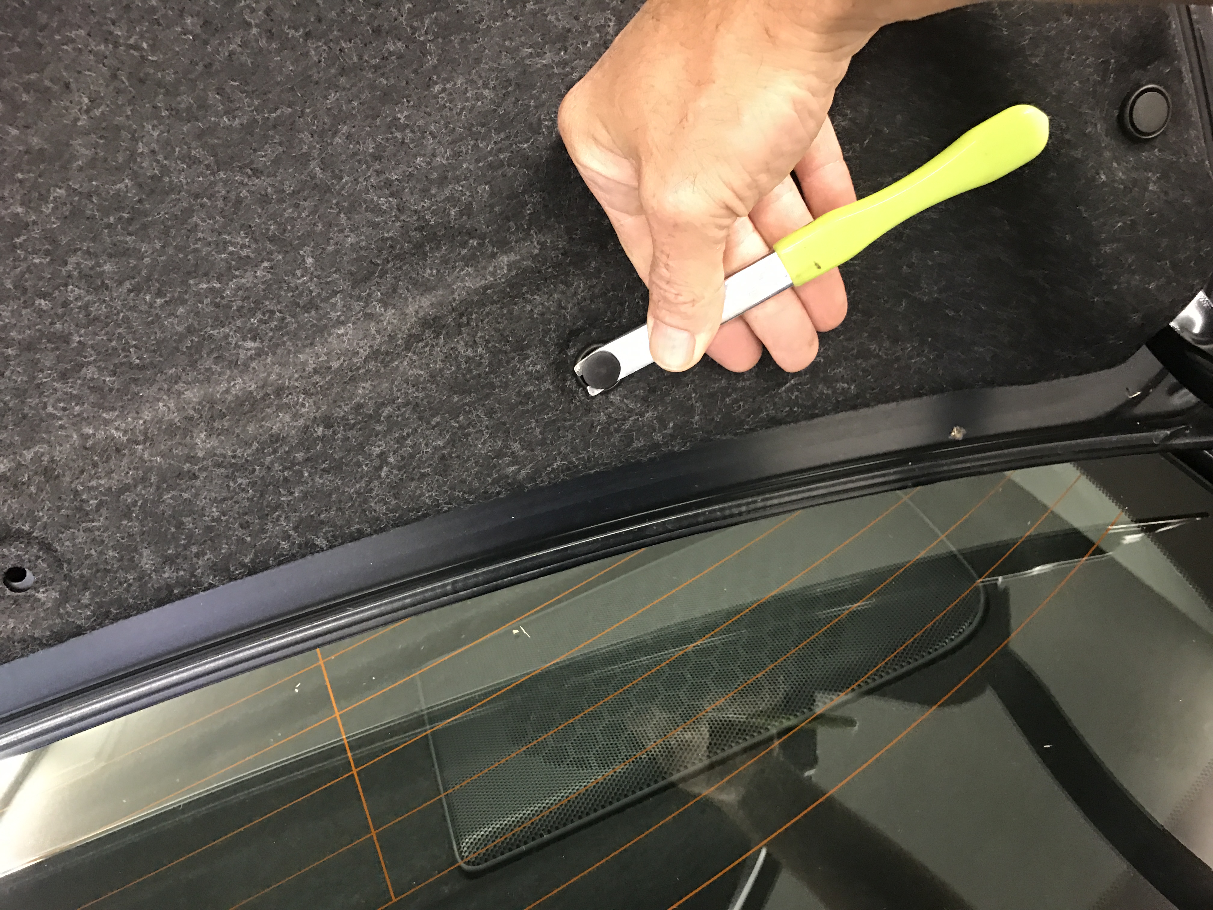 2011 Toyota Camry, Green Clip Removal Tool used in removing the deck (trunk) interior liner. Springfield, IL http://217dent.com