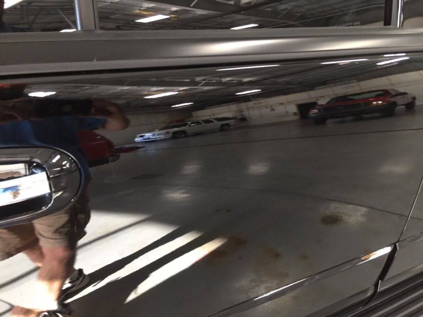 2016 Ford Explorer passenger rear door, Brand new vehicle dent repair performed by Michael Bocek with https://217dent.com and https://217dent.com