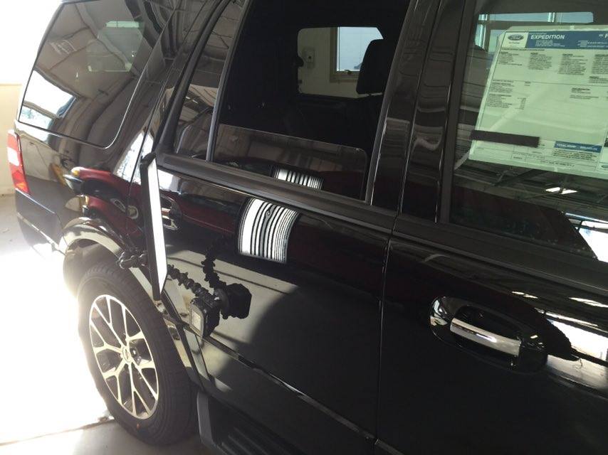 2016 Ford Explorer passenger rear door, Brand new vehicle dent repair performed by Michael Bocek with https://217dent.com and https://217dent.com