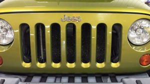 2007 Jeep Wrangler Rubicon Cowl Dent. Work was done by Michael Bocek from 217dent.com. Go to https://217dent.com an estimate, or for more information about paintless dent removal.