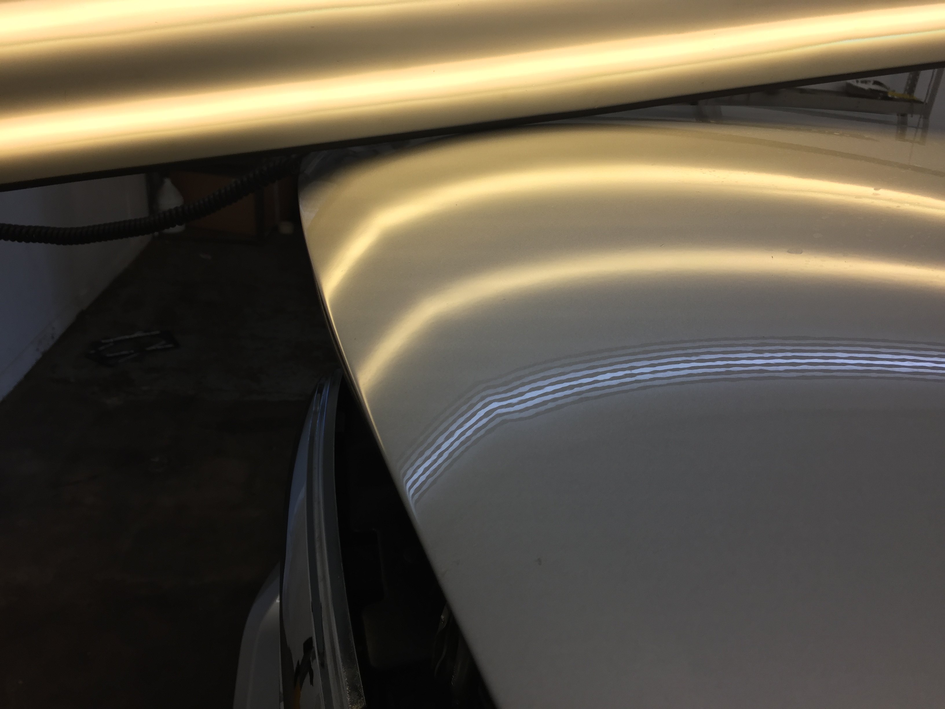 2015 Dodge Ram hail damage on hood, paintless dent repair, Springfield, IL. https://217dent.com by Michael Bocek
