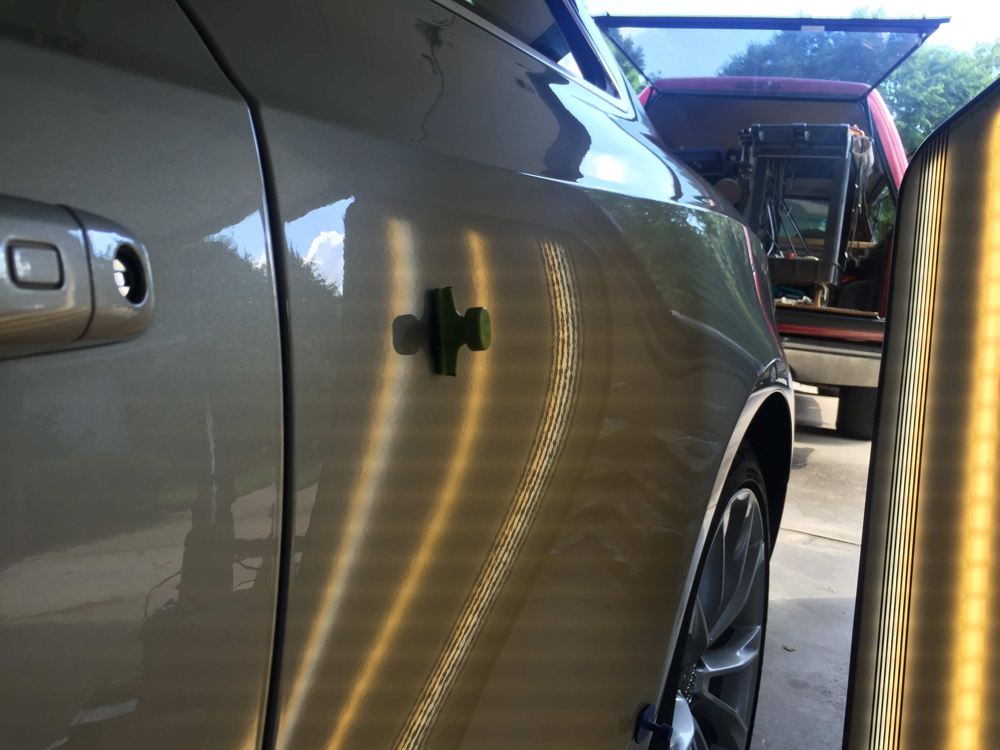 2013 Audi A5 Dent Repair on drivers rear quarter, paintless dent removal Springfield, IL https://217dent.com