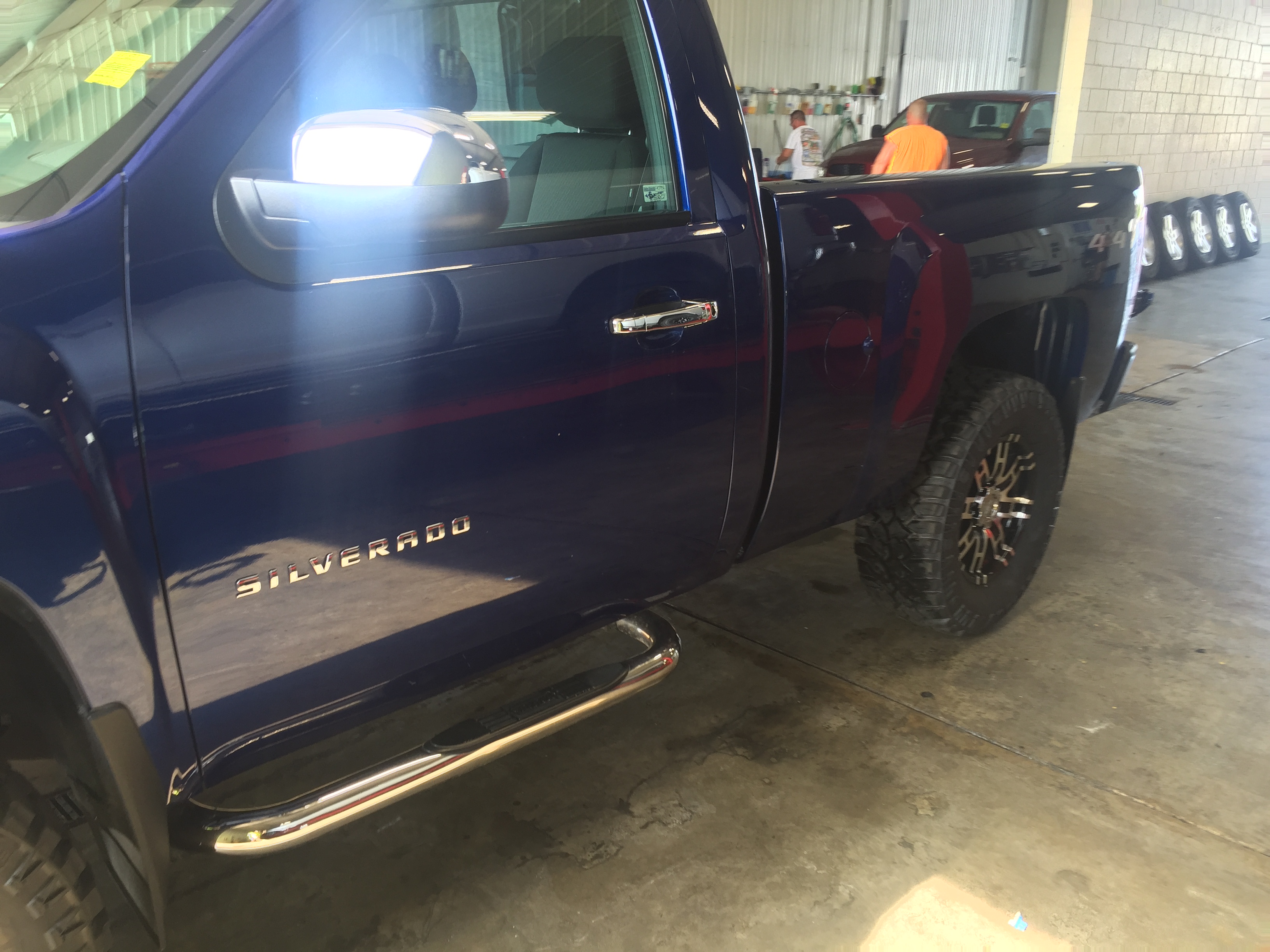 2013 Chevy Silverado, dent repair on the bedside removed with paintless dent removal, in or around Springfield, IL, http://217dent.com