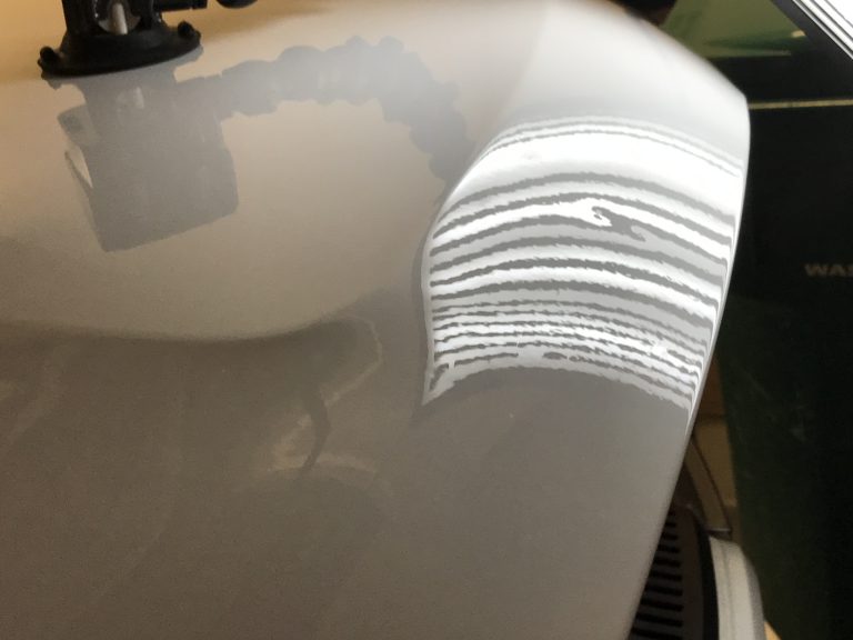 2015 Dodge Durango RT: hood dents, before paintless dent repair