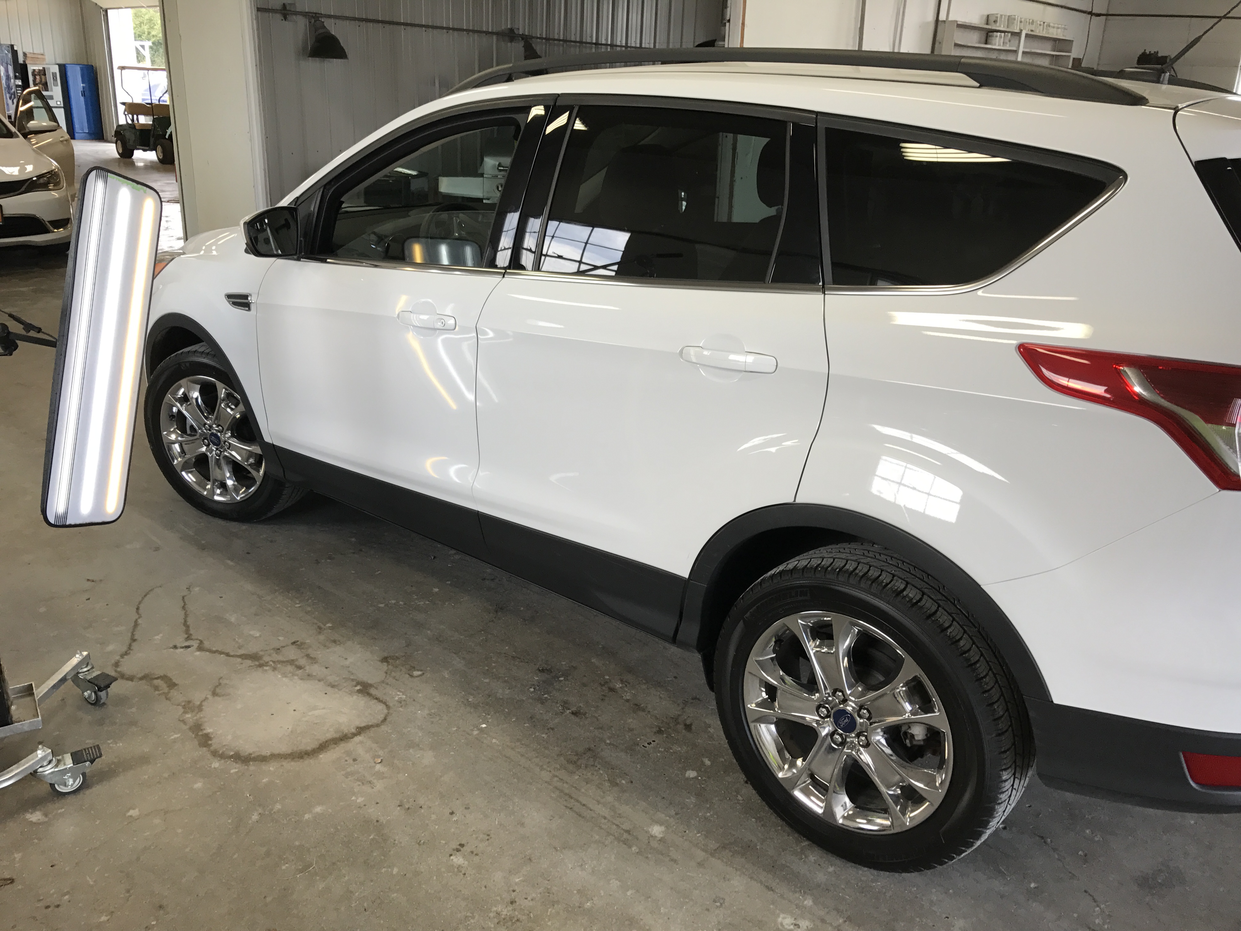 2016 Ford Escape dent removal on the drivers door, in Pana IL, Springfield IL, we are all set up and ready to make these dents disappear.