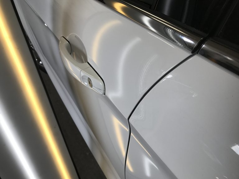 2016 Ford Escape: dents in the driver's door, after paintless dent repair