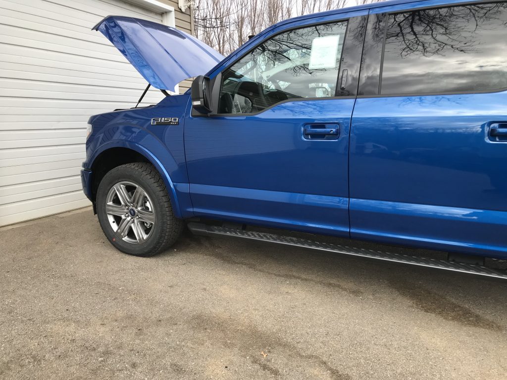 https://217dent.com 2018 Ford F-150 Aluminum Truck with hail damage on hood roof and sides, Collinsville Hail Repair