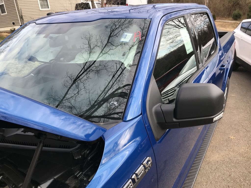 https://217dent.com 2018 Ford F-150 Aluminum Truck with hail damage on hood roof and sides, Collinsville Hail Repair