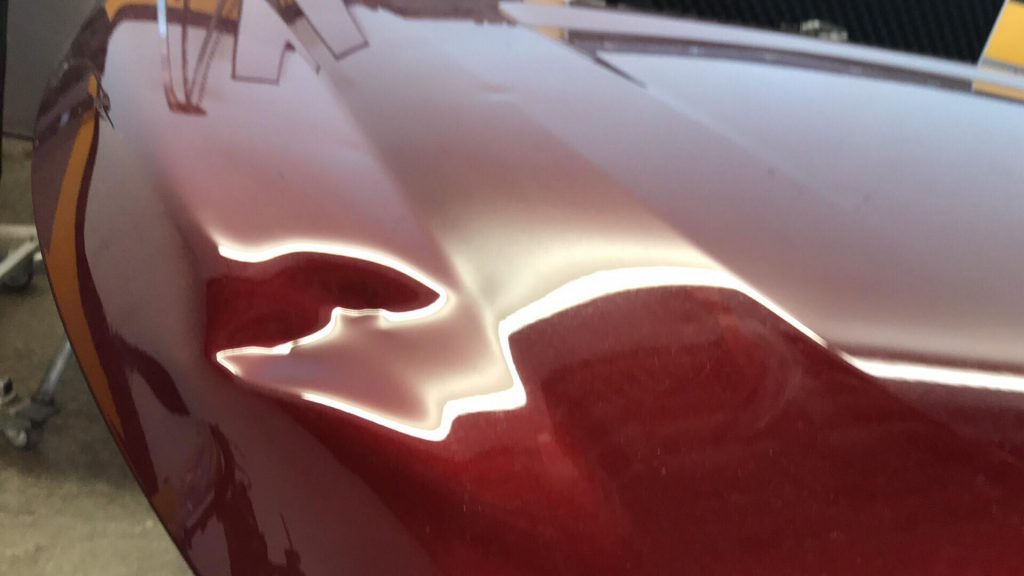 http://PuebloHailAndDent.com Large softball size dent on hood of this 2018 Acadia, one shop through it away and we picked it up to repair it and show off our work in our shop. Come and see this dent and watch a video of the repair process. http://PuebloHailAndDent.com Pueblo Colorado, 30 minutes south of Colorado Springs on 25