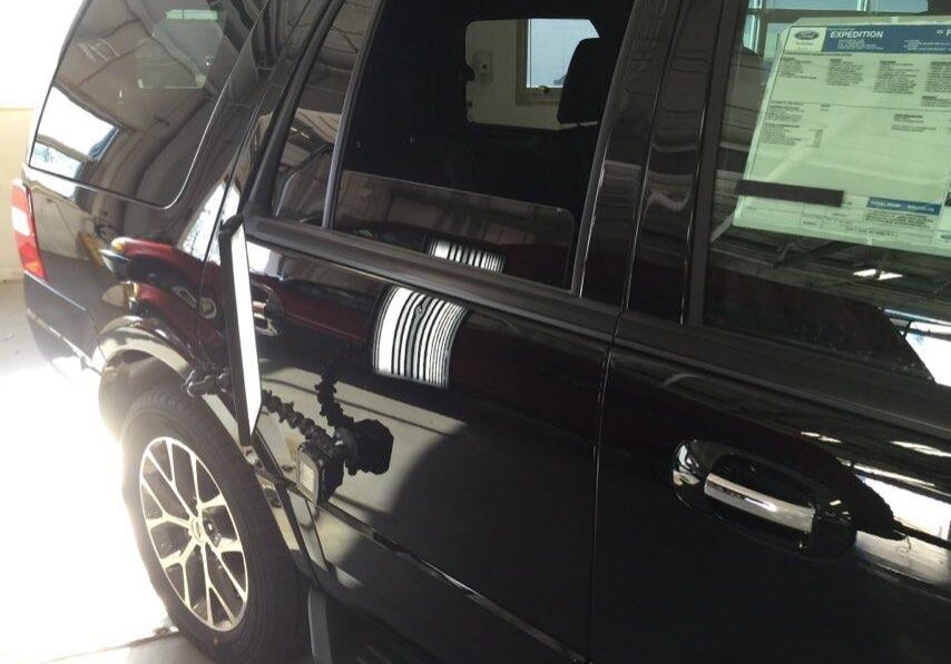 2016 Ford Explorer passenger rear door, Brand new vehicle dent repair performed by Michael Bocek with http://217dent.com and http://217dent.com